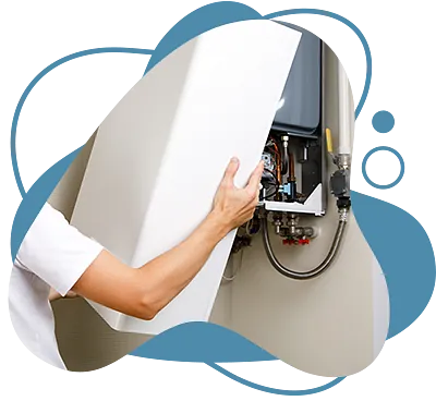 Installateur tauscht Gastherme aus